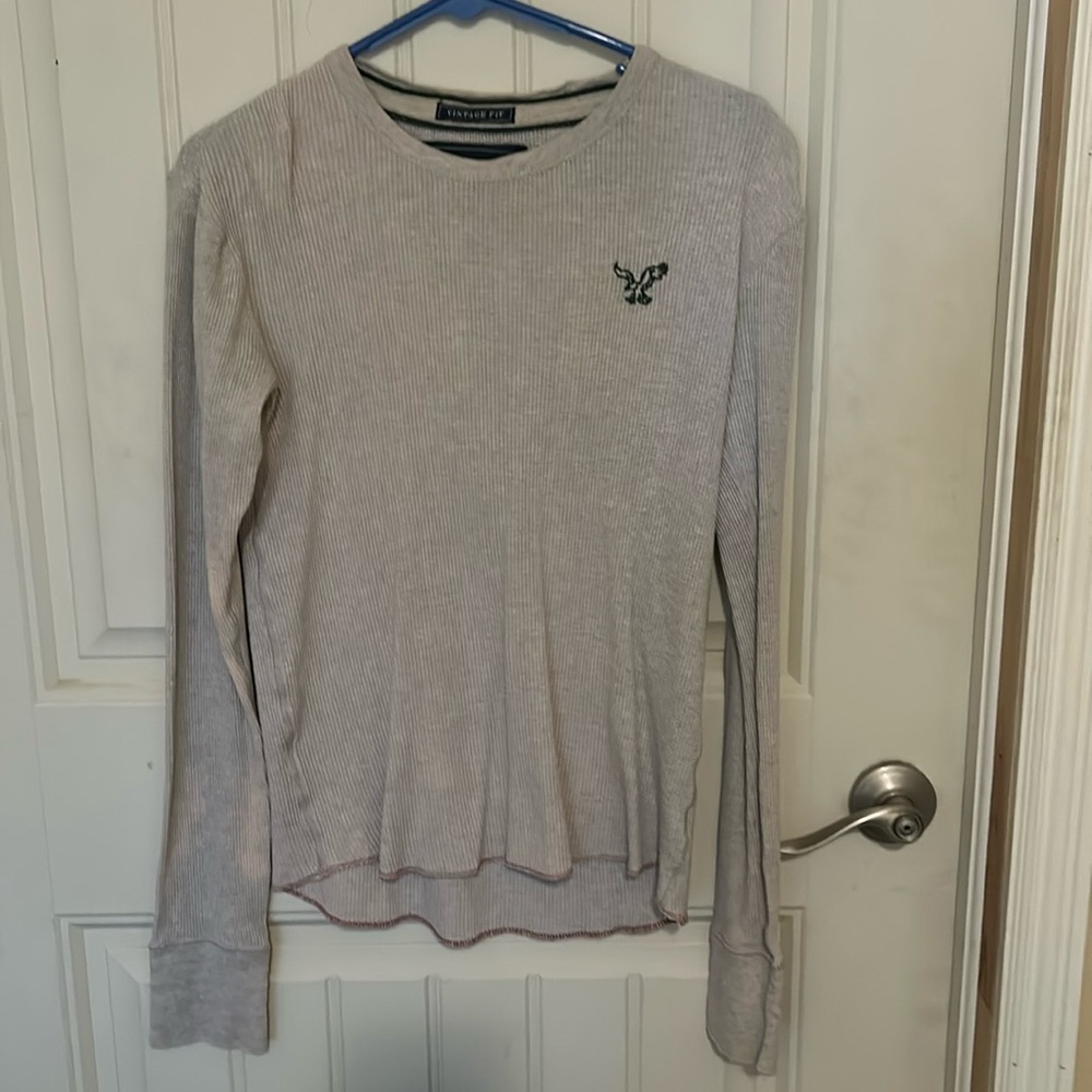 Cream colored waffle shirt.